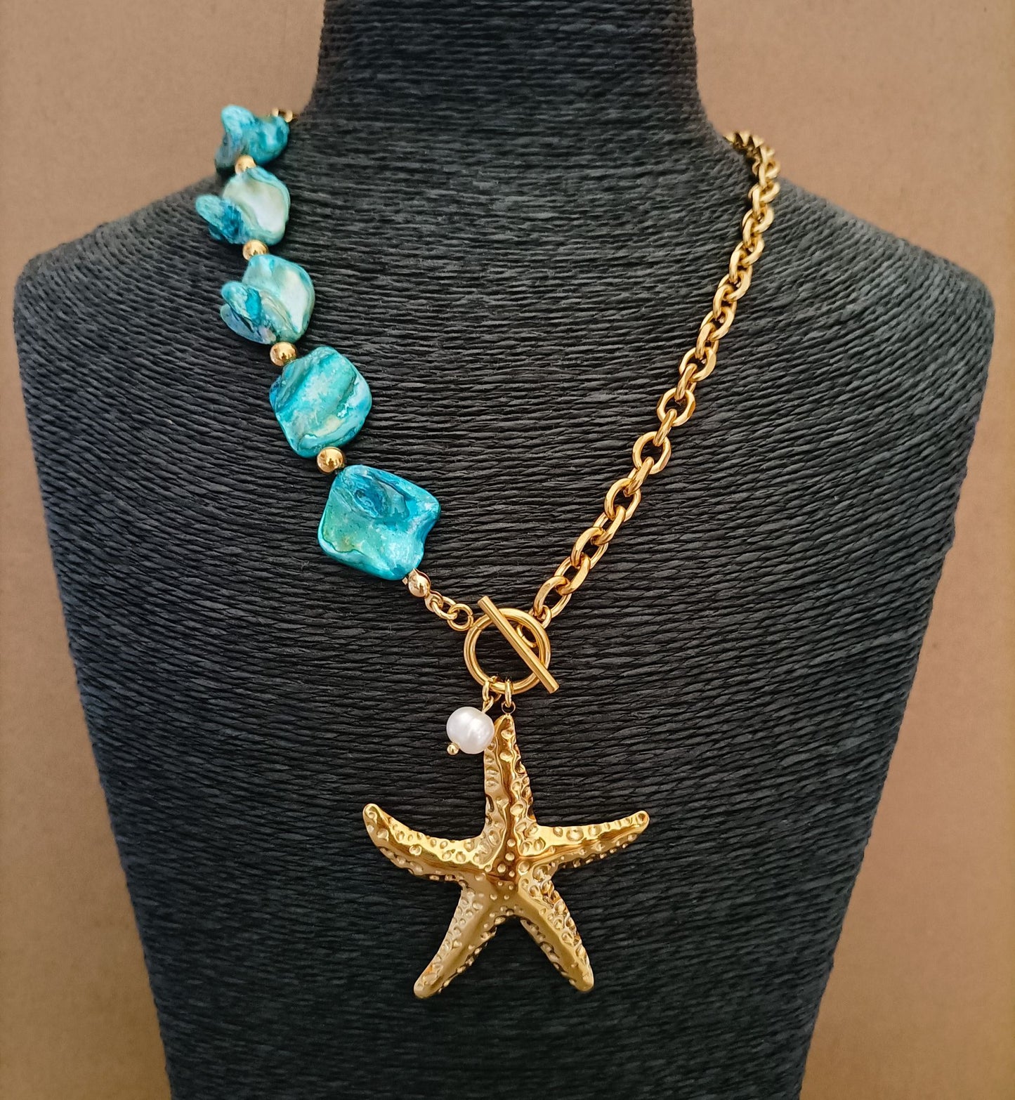 Colar Estrela do Mar - em aço inoxidável dourado