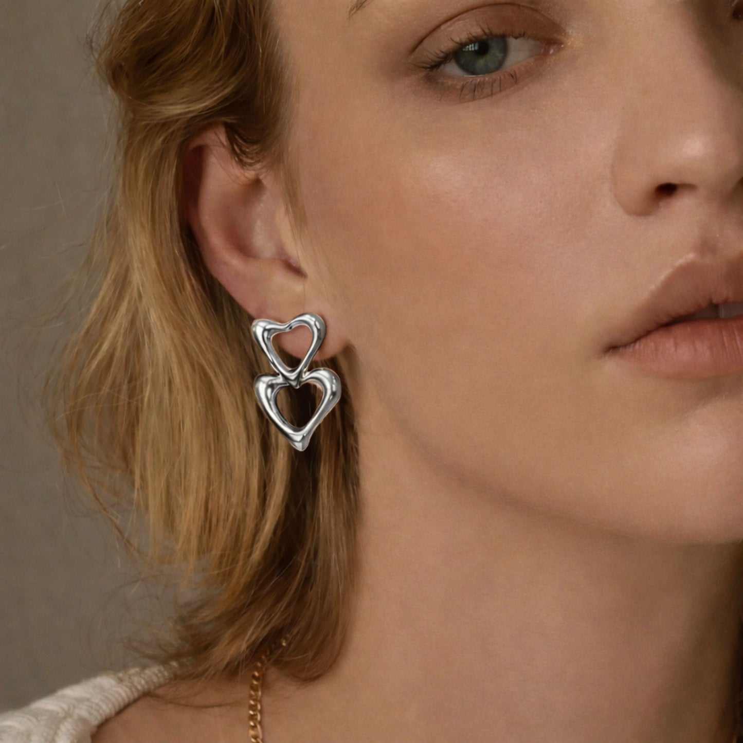 Brincos Two Hearts - em aço inoxidável